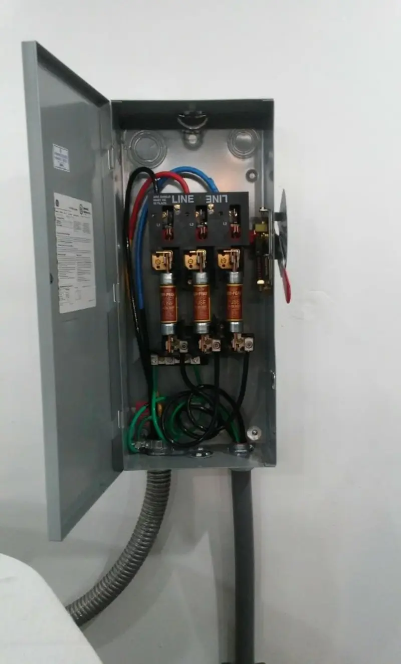 Three-phase disconnect switch installed for Smoke Detector Installation in Oyster Bay